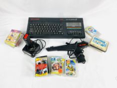 Sinclair ZX Spectrum Plus 2 with joystick, gun and games.