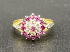 Pink sapphire and diamond cluster ring