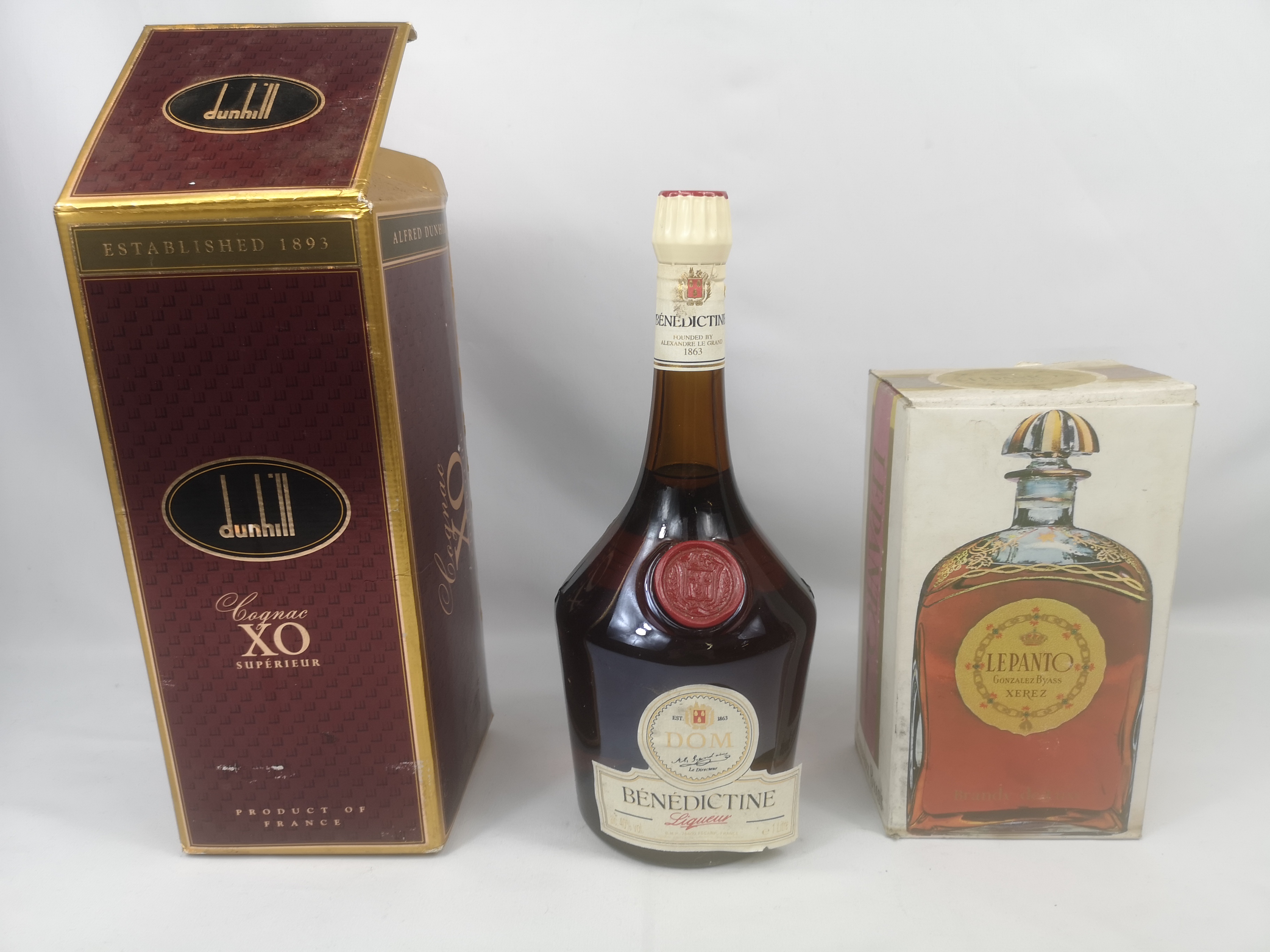 70cl Dunhill cognac, 1l bottle of Benedictine, bottle LePanto brandy