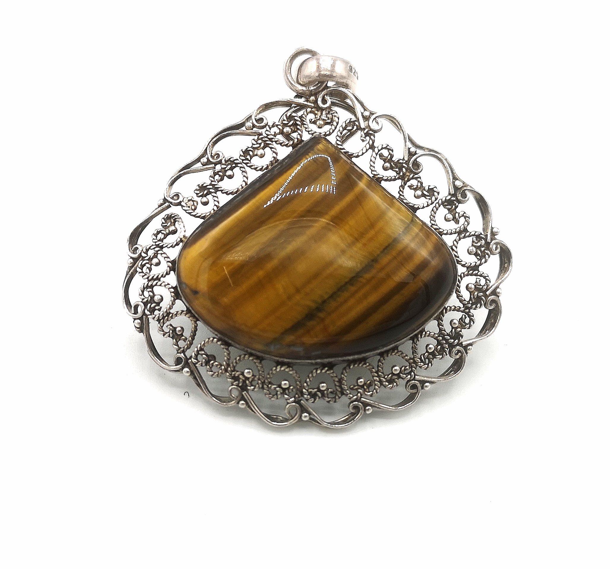 Silver pendant set with a tiger eye