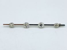 18ct gold and platinum bar brooch set with four diamonds