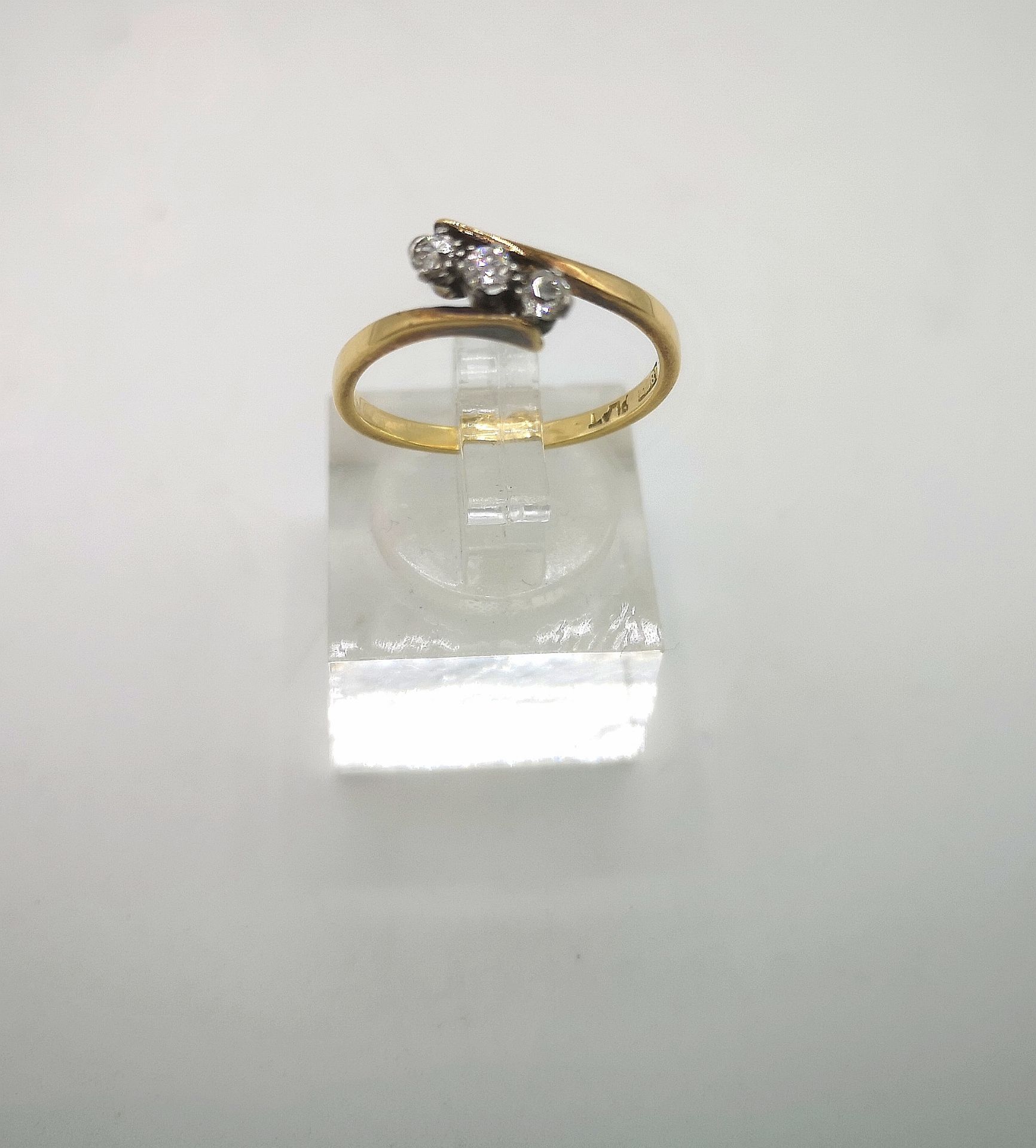 18ct gold and three diamond ring