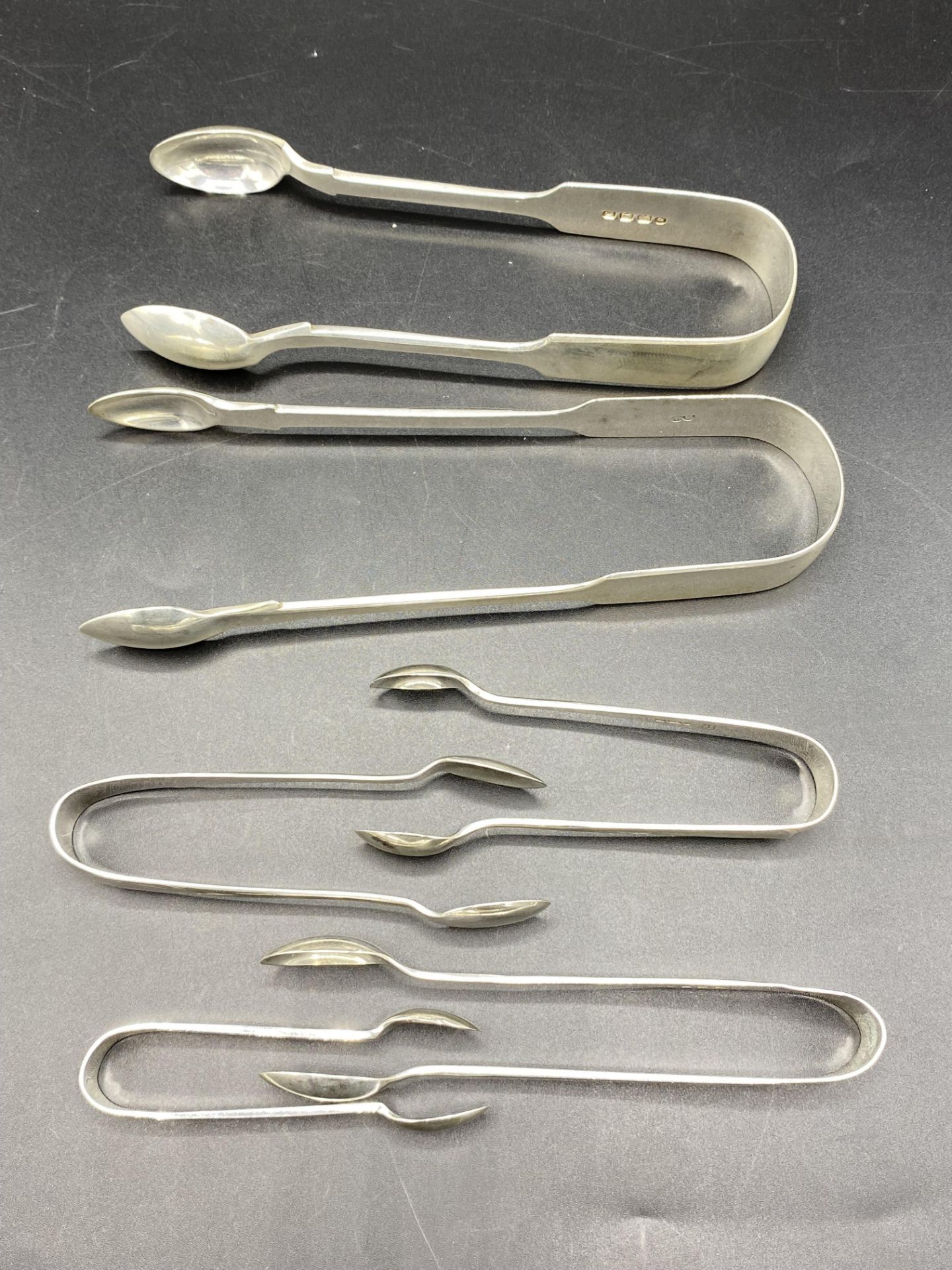 Six pair of silver sugar tongs - Image 3 of 3