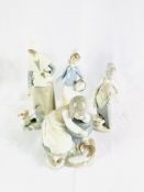 Four Neo figures; together with four Lladro figures