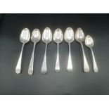 Two Georgian silver spoons with five other silver spoons