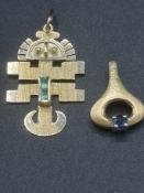 18ct gold Aztec style pendant