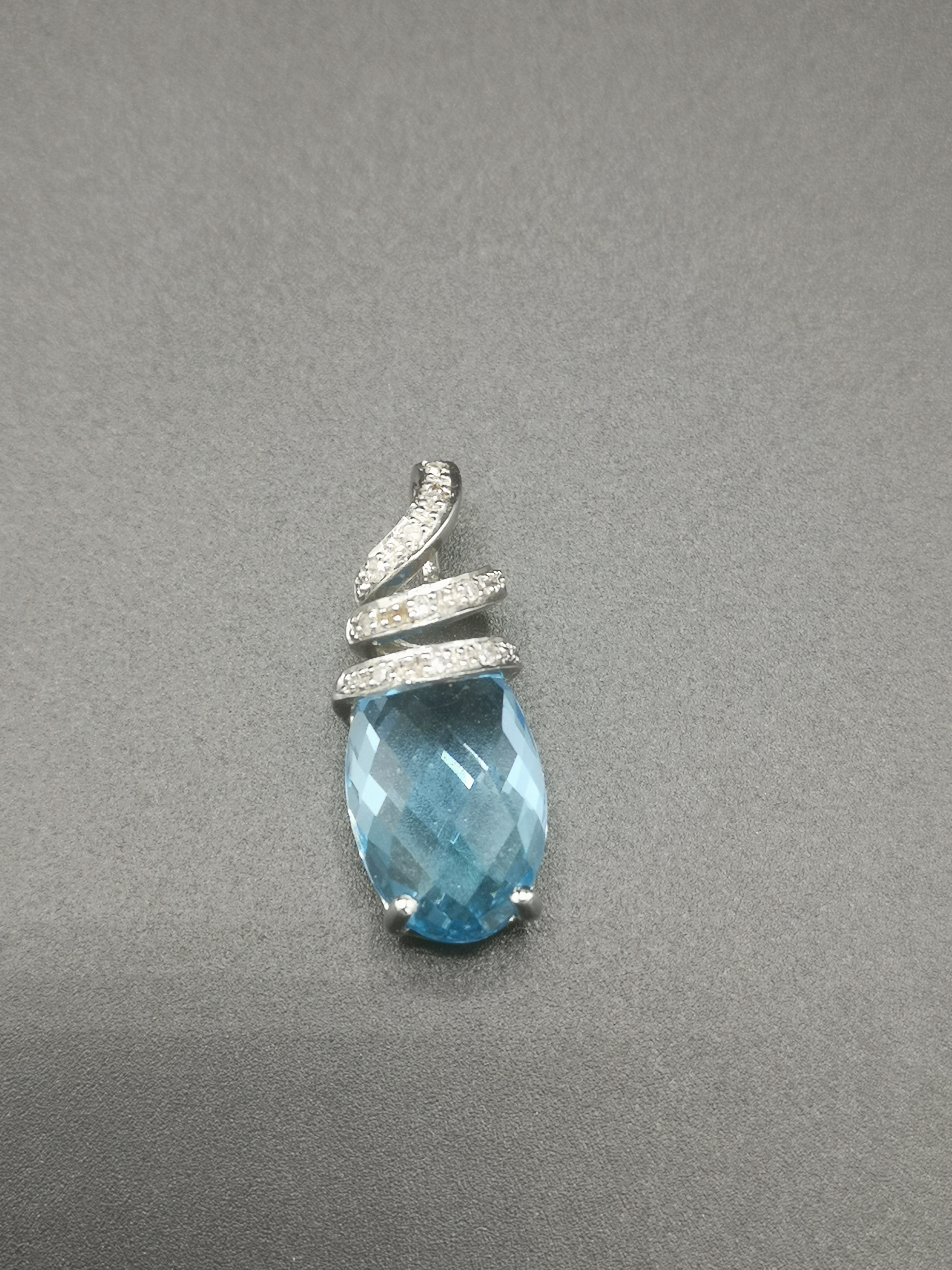 9ct white gold, diamond and topaz pendant