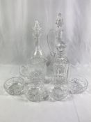 Three crystal glass decanters and other glassware