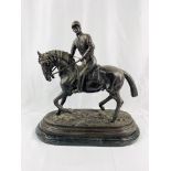 Spelter figure of a horse and rider