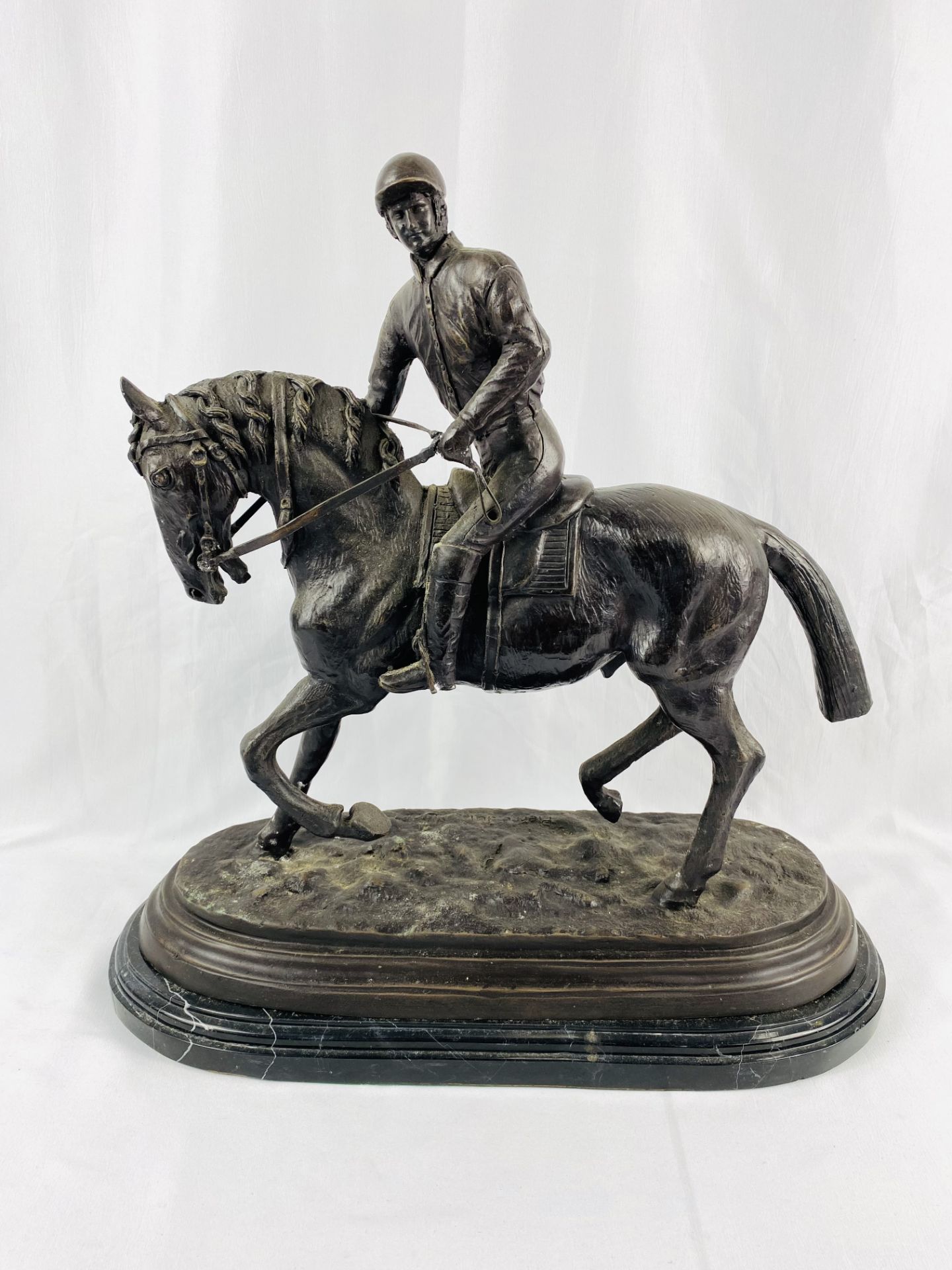 Spelter figure of a horse and rider