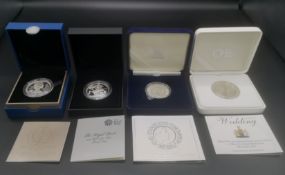 Four Royal Mint boxed silver £5 coins