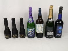Bottle of Champagne and other bottles