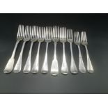 Five Georgian silver forks with five other silver forks