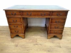 Mahogany veneer pedestal desk