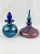 Two iridescent glass perfume bottles