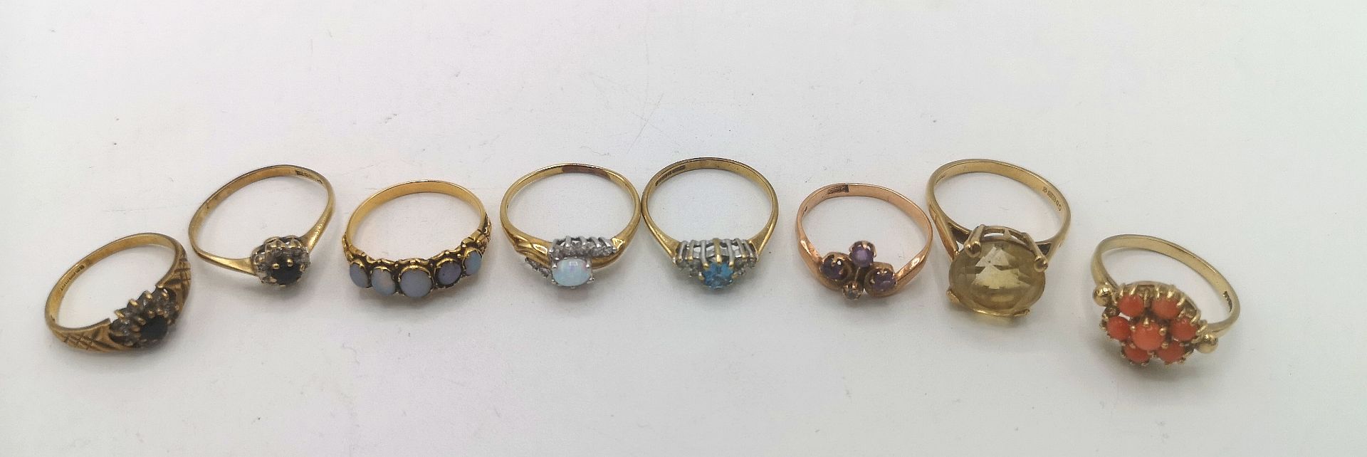 Eight 9ct gold rings