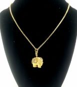 18ct gold elephant pendant set with gemstones on 18ct gold chain