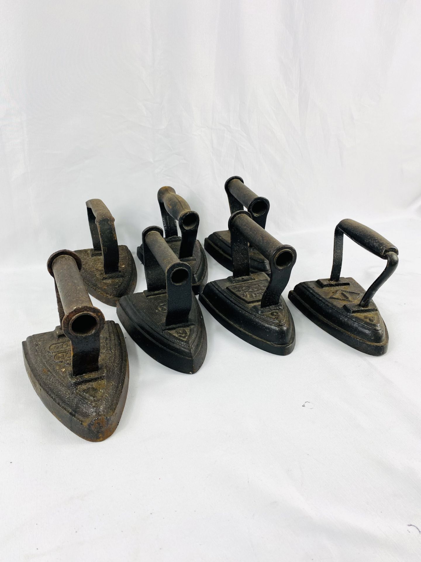 Seven cast iron flat irons - Image 3 of 6