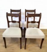 Four oak ladder back dining chairs