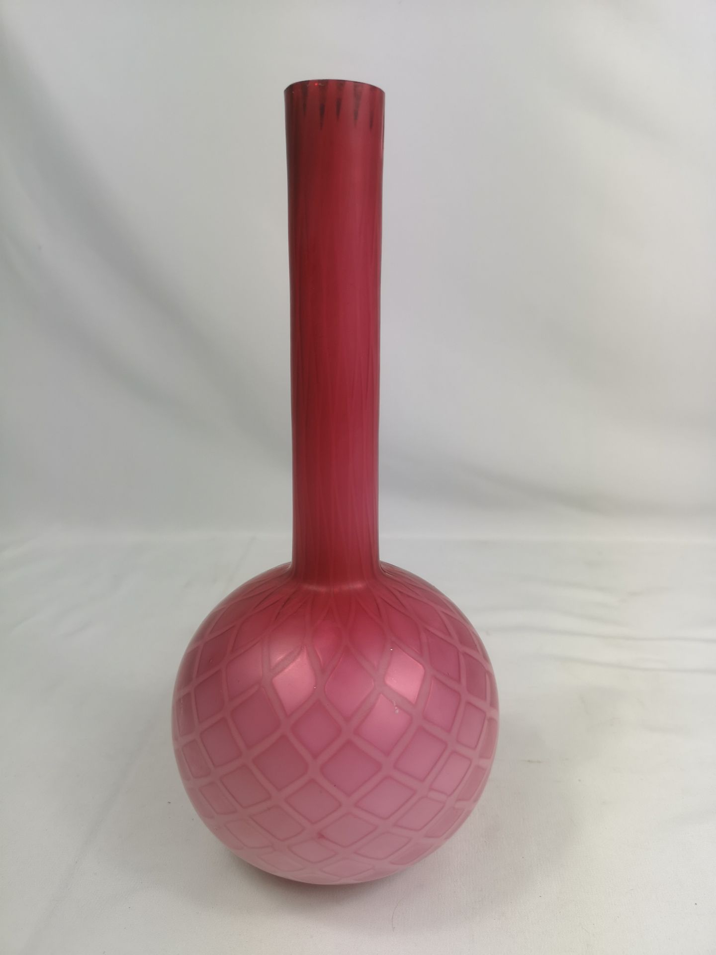 Layered cranberry over opalescent glass vase