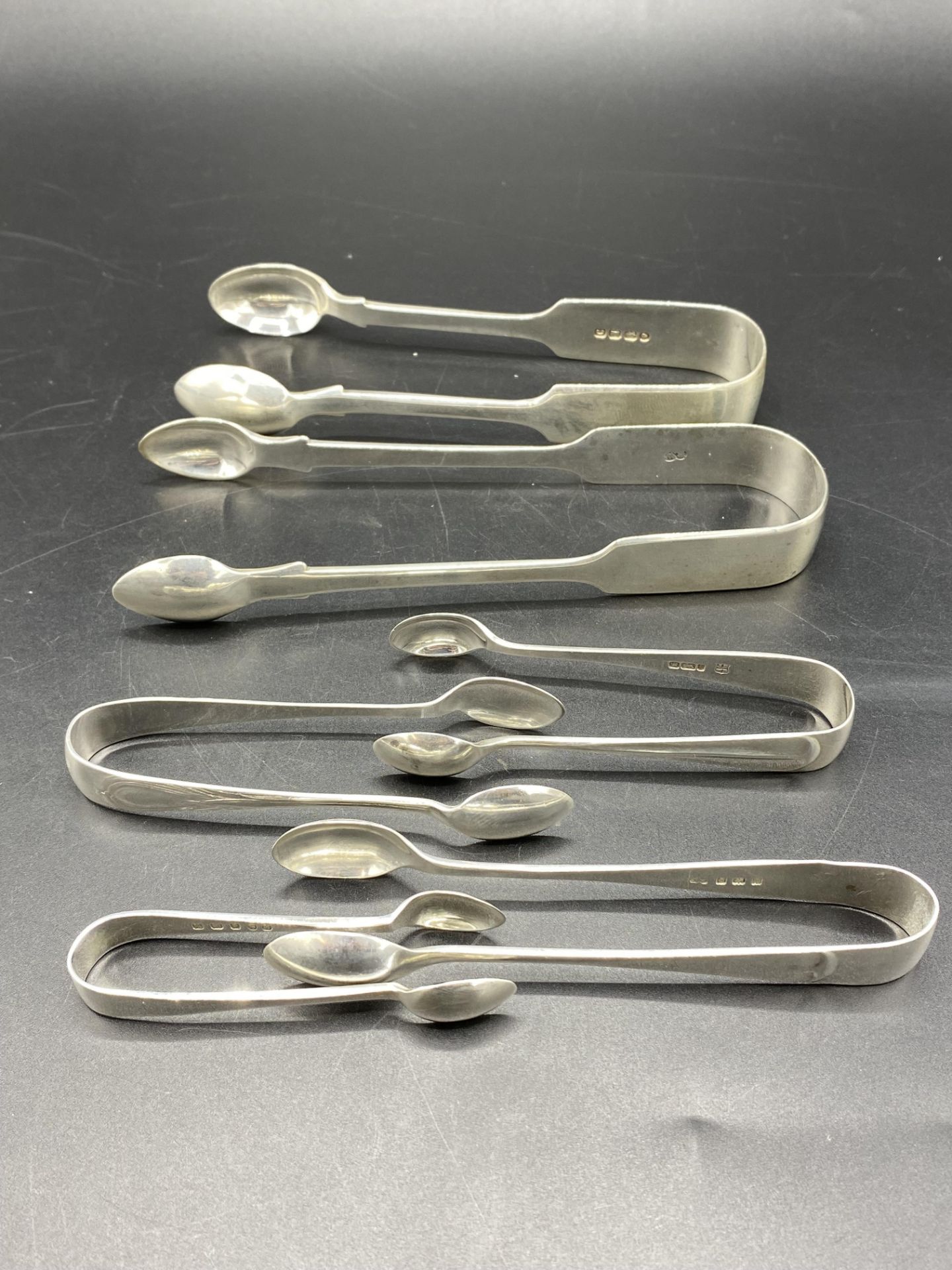 Six pair of silver sugar tongs - Image 2 of 3