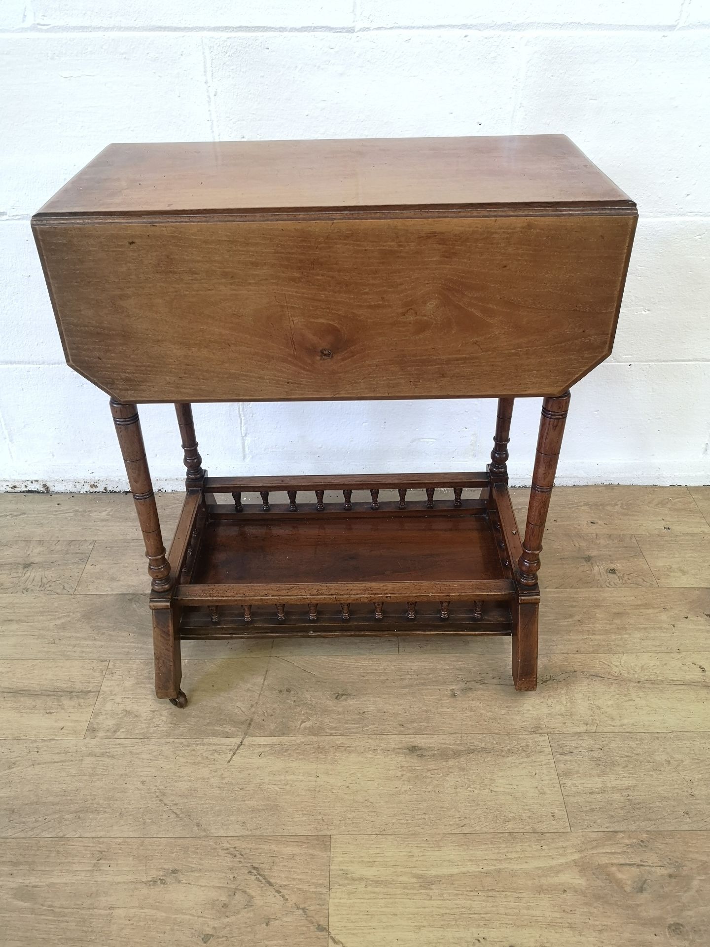Mahogany drop leaf side table with canted corners