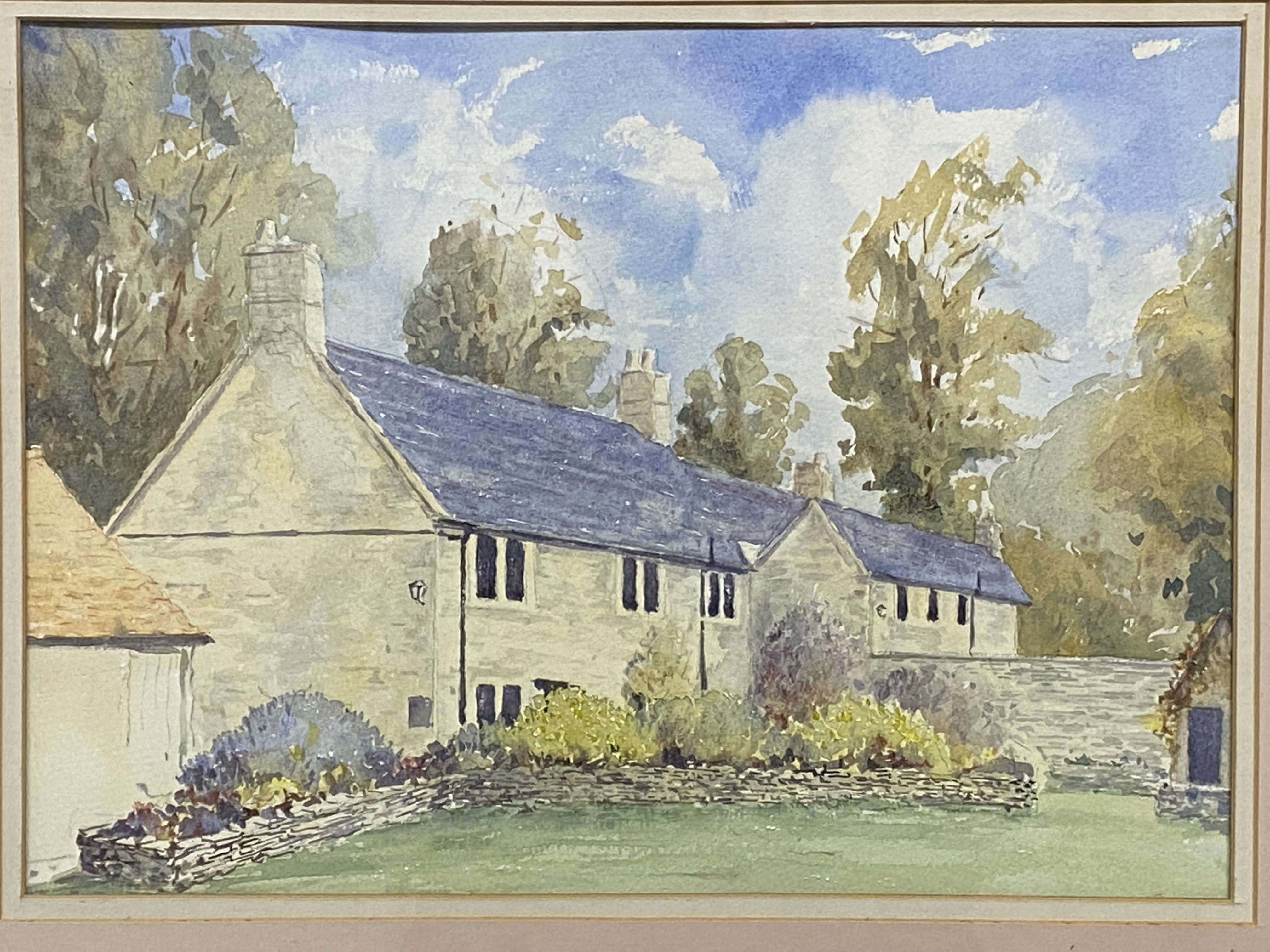 Framed and glazed watercolour of a cottage