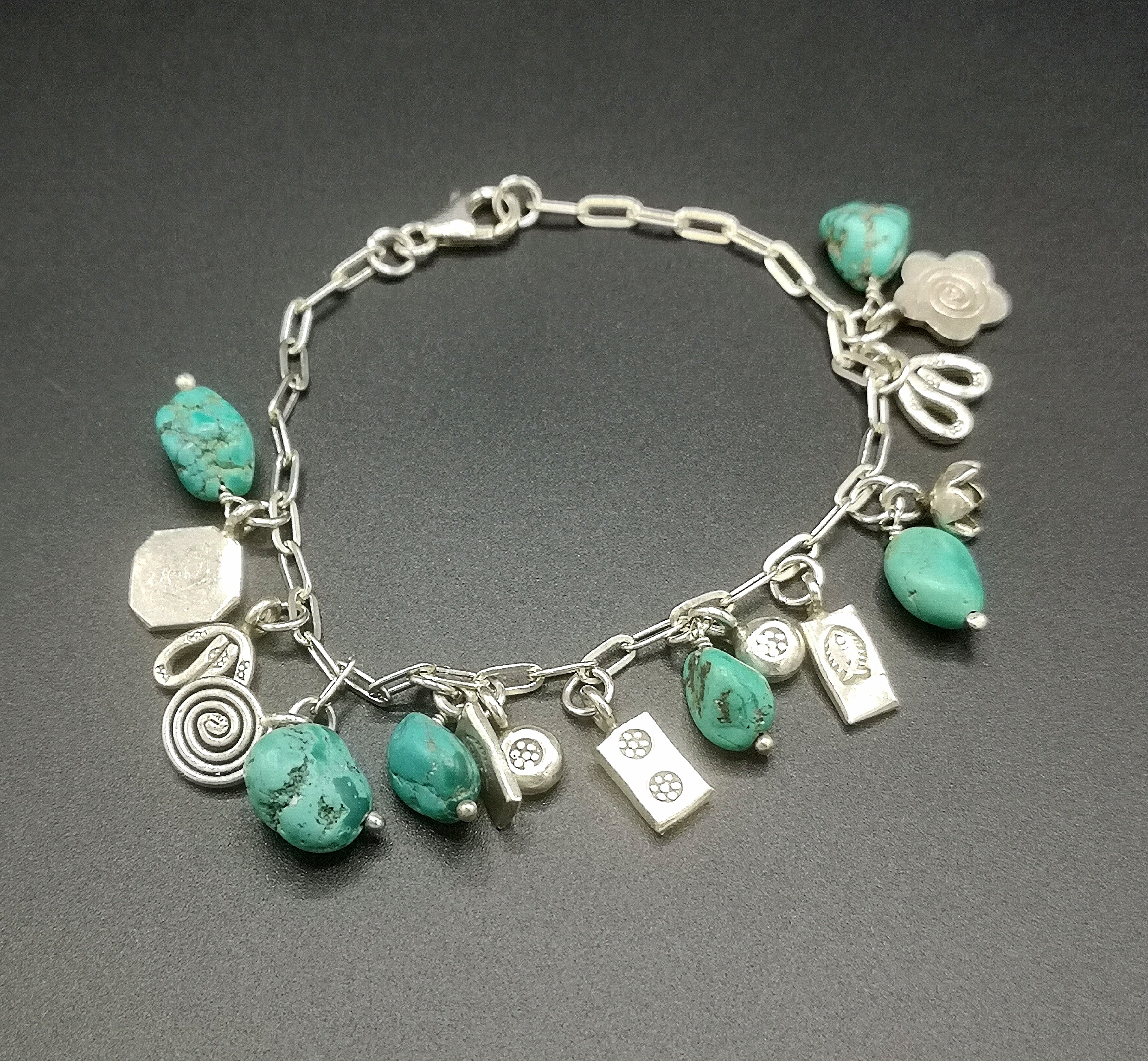 Silver and turquoise charm bracelet