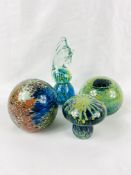 Four Mdina glass paperweights