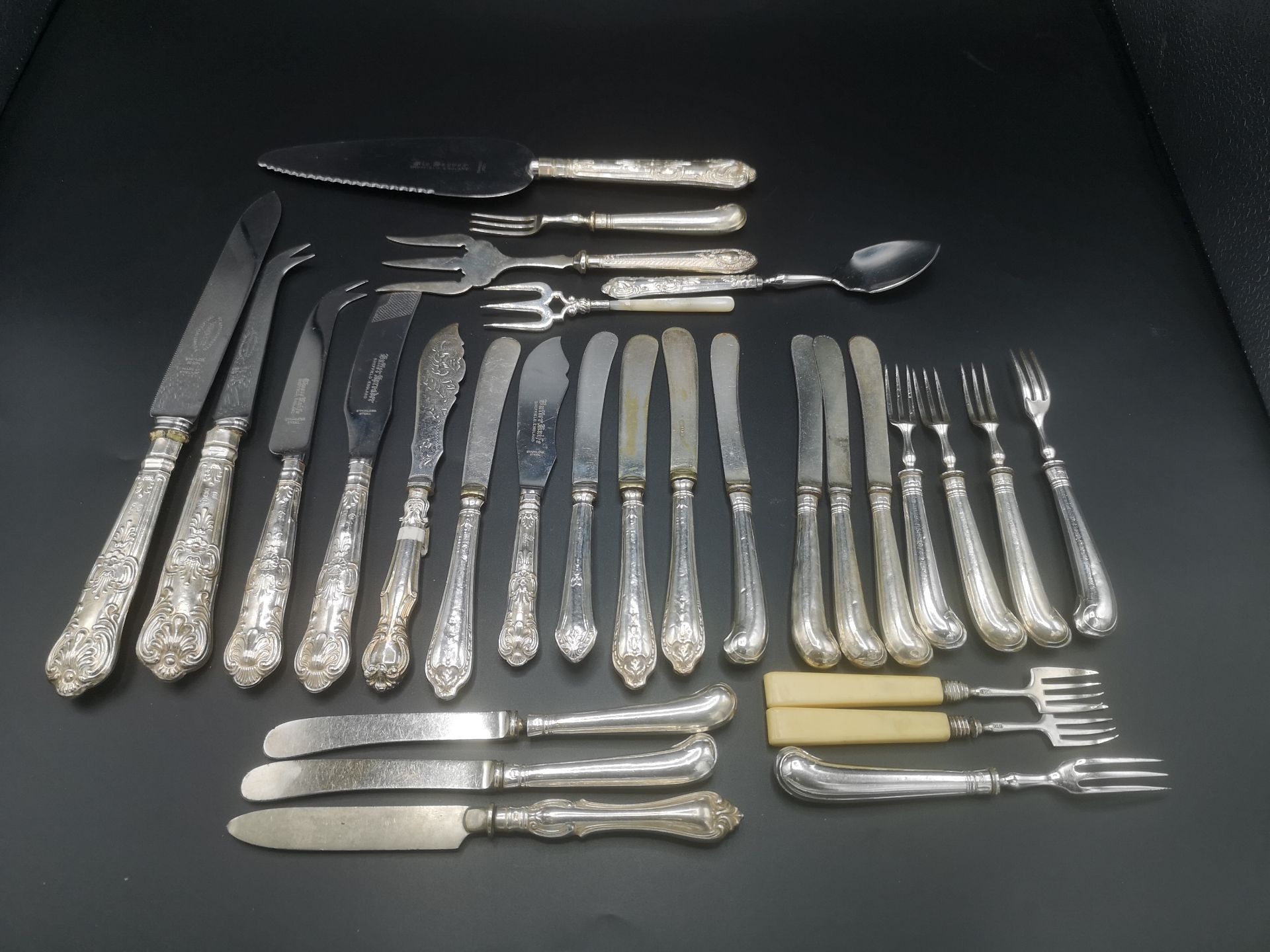 Quantity of flatware with silver handles