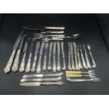 Quantity of flatware with silver handles