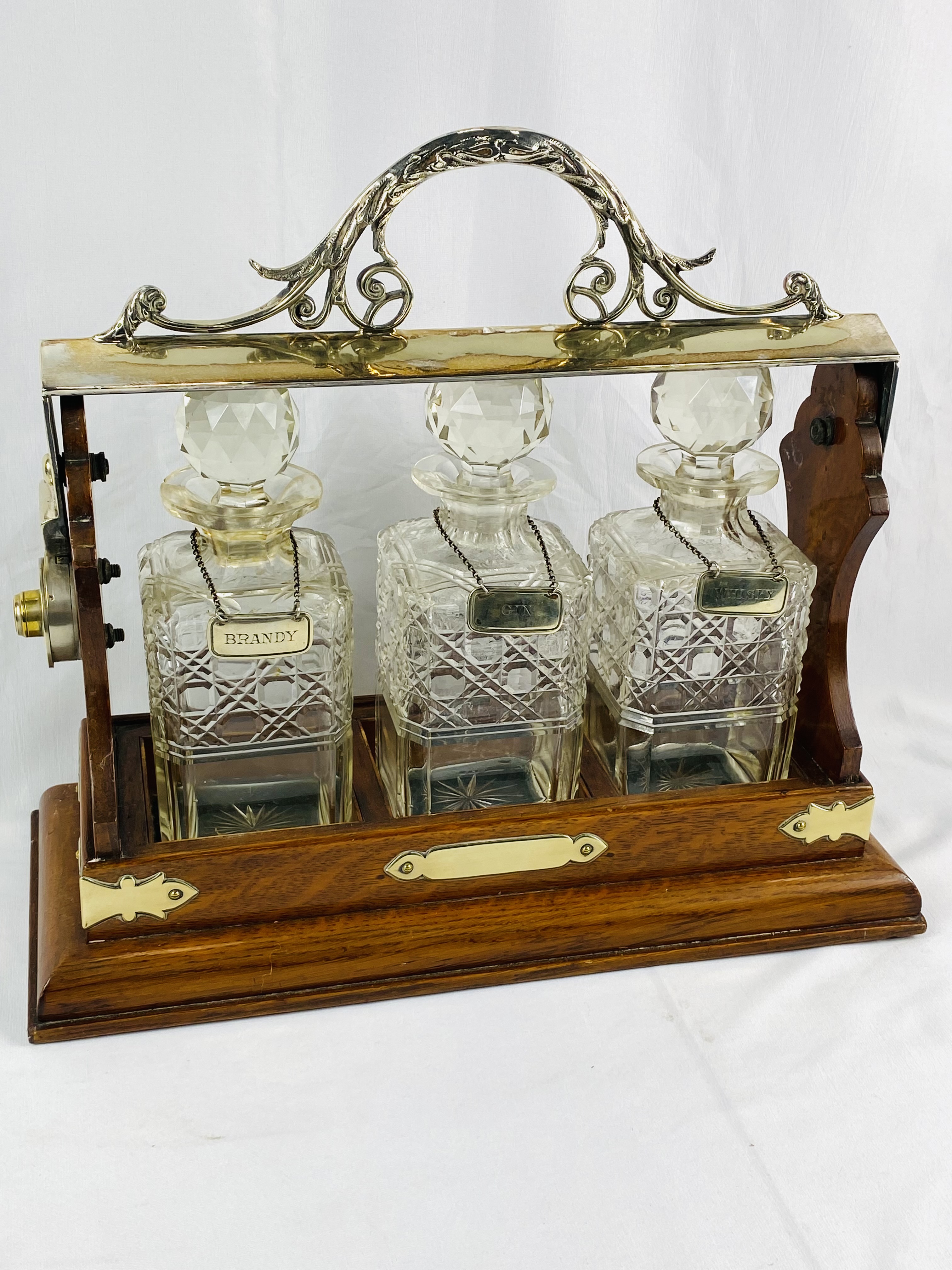 Oak and silver plate three bottle tantalus - Image 2 of 4