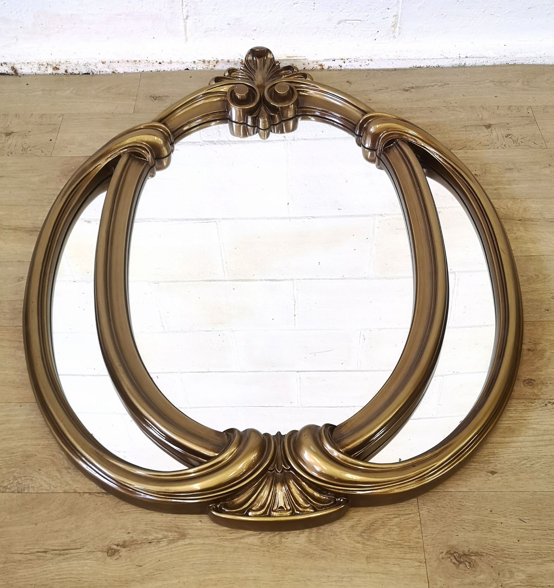 Contemporary bronze painted wall mirror