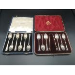 Two sets of silver tea spoons