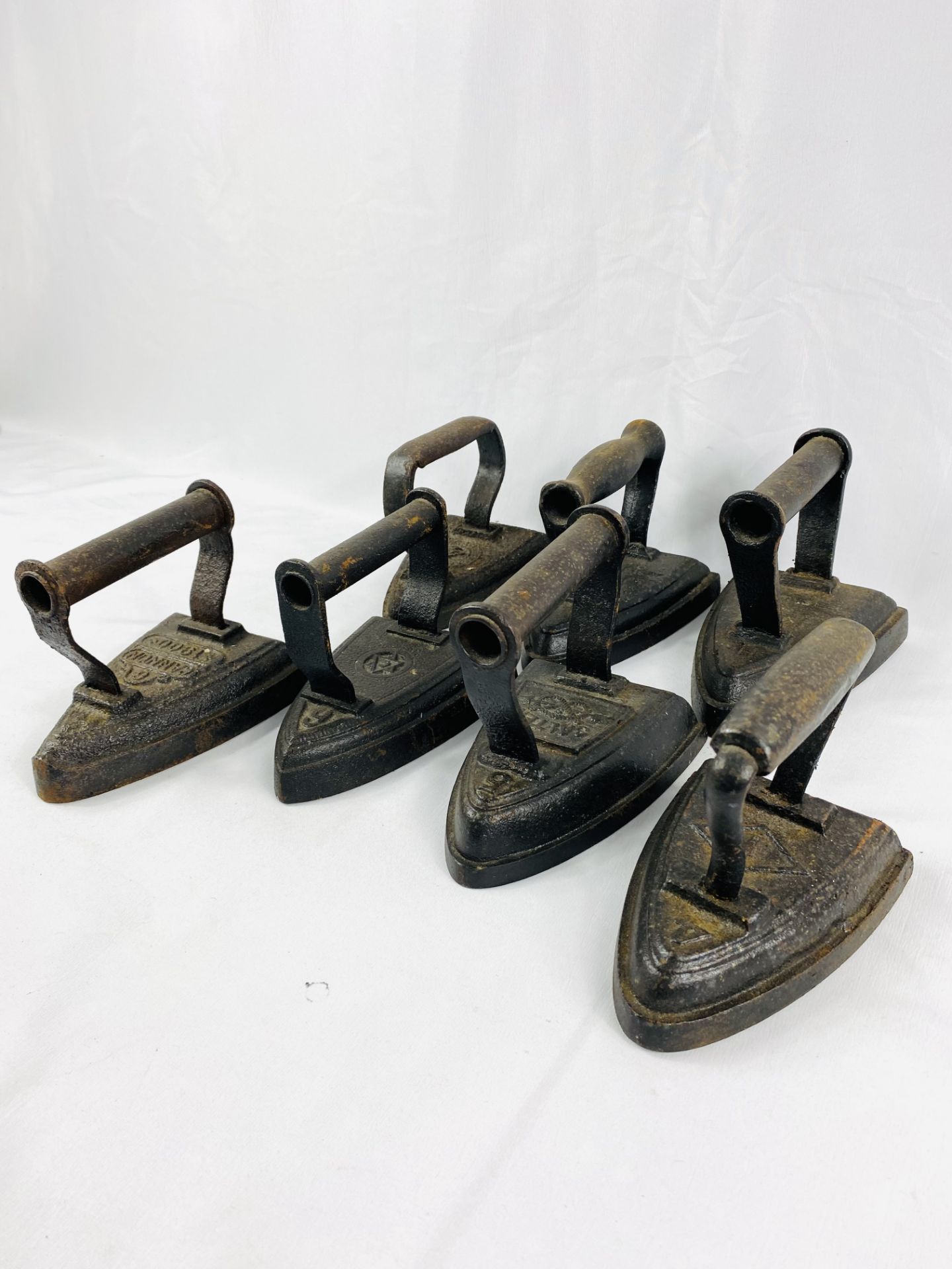 Seven cast iron flat irons - Image 2 of 6