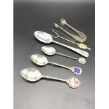 Three silver commemorative tea spoons and other items of silver