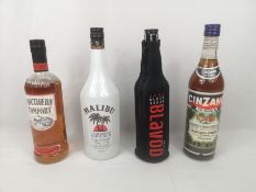 1l bottle of Malibu and other bottles