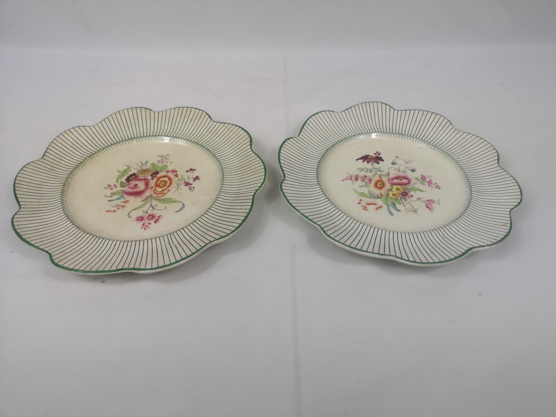 Two hand painted cabinet plates