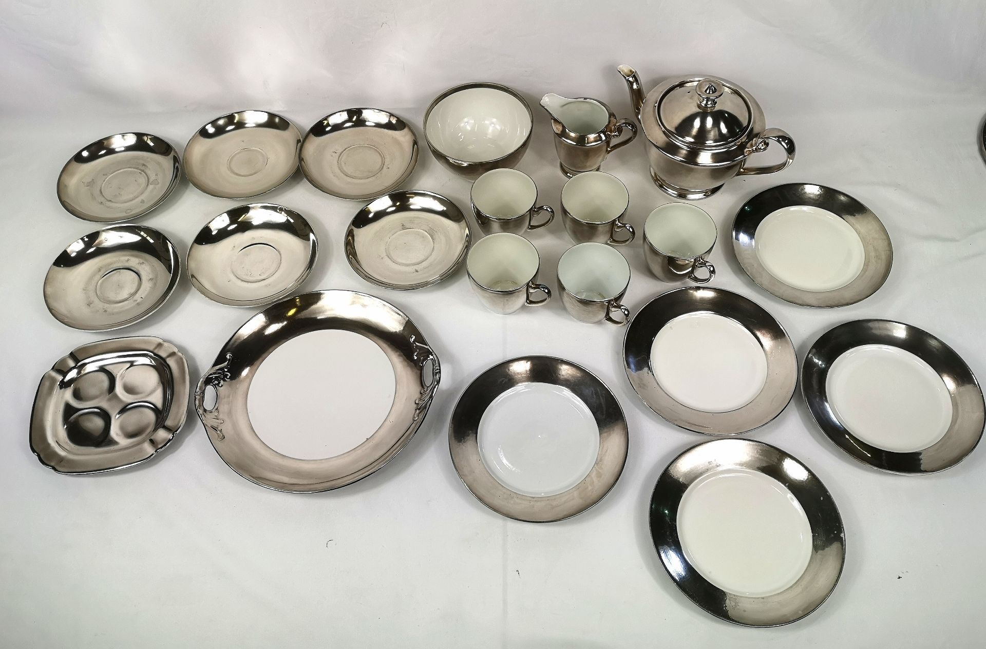 Silver on porcelain part tea set