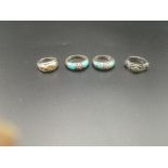 Two matching silver and turquoise rings