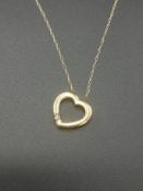 9ct gold chain and heart shaped pendant set with a diamond