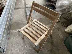 40 wooden folding chairs. This lot is subject to VAT
