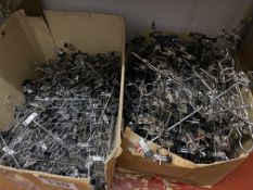 Metal clip hangers for child and adults. This lot is subject to VAT.