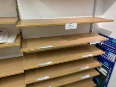 25 no 1m wooden shelves. This lot is subject to VAT.