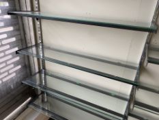 20 no 1m glass display shelves. This lot is subject to VAT.