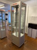 Display cabinet 60 x 45 x 2.02m with lights, open one side. This lot is subject to VAT.