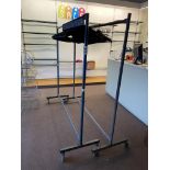 2 metal display racks. This lot is subject to VAT.