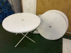 7 x 84cm diameter white plastic tables with metal folding legs. This lot is subject to VAT.