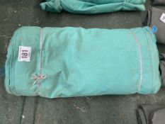 24 x 21ft green PVC tarpaulin, hemmed and eyeleted. This lot is subject to VAT.