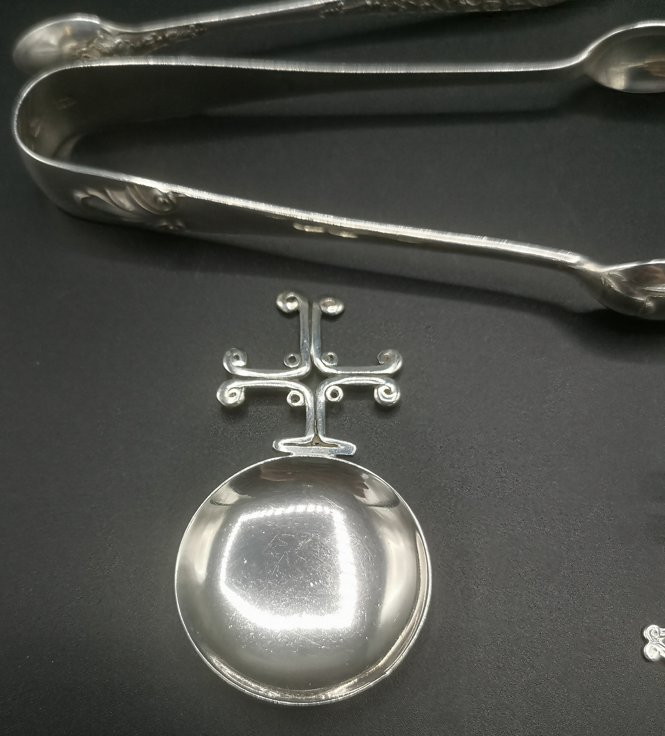 Silver tea strainer with other silver spoons together with silver plate sugar tongs - Image 6 of 10
